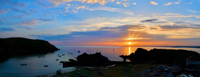 sunset over hope cove as seen from the restaurant